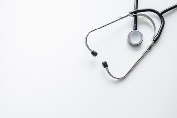 A stethoscope on white background with copy space.