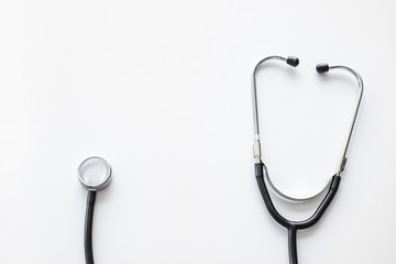 A stethoscope on white background with copy space.