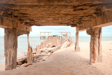 Breaking port Cement columns on piers are constantly corroded.