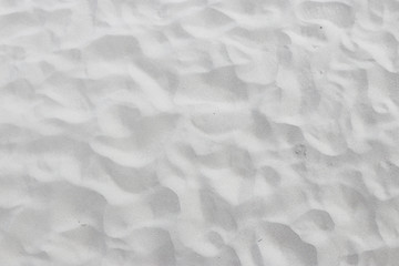 The sand was blown and shaped, by the sea.