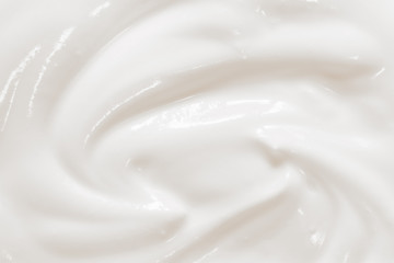 Fototapeta na wymiar Sour cream, creamy yogurt texture. White dairy food background