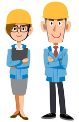 青い作業着を着用した建設現場の男女