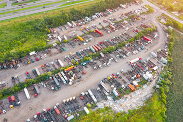 Aerial top view semi truck cargo trailer parking.