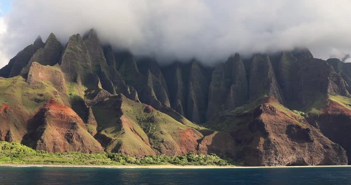 Hawaii beach, Kauai. Na pali coast view from water. Famous Hawaiian travel destination. Napali coastline in Kaui, Hawaii, USA, the Honopu arch.