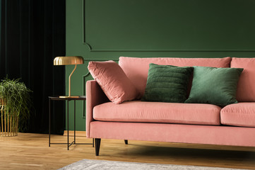 Living room glamour design, pink and green interior