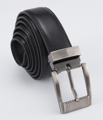 black leather belt isolated on white background