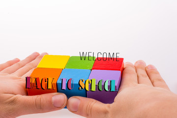 Hand playing with cubes
