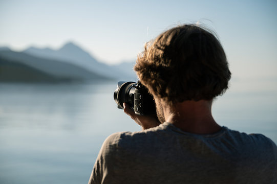 Professional photographer taking photos of beautiful morning nature