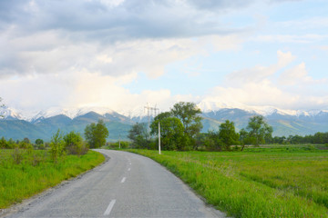 Fototapeta na wymiar road leading to the Fagaras mountains