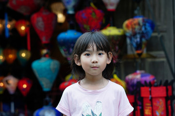 Fototapeta na wymiar Portrait Asian cute little girl smiling happy