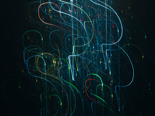 Neon yellow, blue, pink illuminated swirly lines. Colored sparks and rays. Abstract art background.