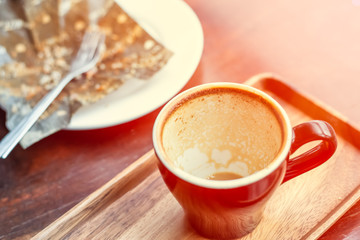 Empty coffee cup after drink on wood table