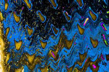 Dotted background formed by splashing watercolor paint