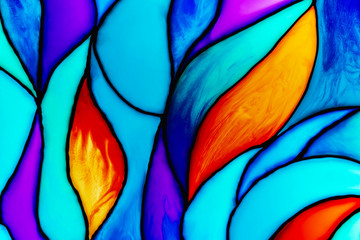 Small fragment of a beautiful colorful stained glass background including orange, turquoise, blue, and violet pieces. Abstract background..