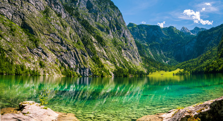 Fototapeta na wymiar The Obersee which is behind the Königssee as a quite place for hiking and relaxing and to enjoy nature in Germany 
