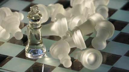 The concept of business competition: Close-up of glass chess footage slow motion