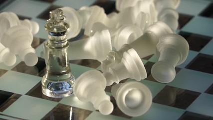The concept of business competition: Close-up of glass chess footage slow motion