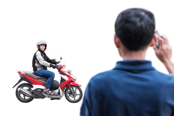 Asian motorcycle taxi man pick up his passenger
