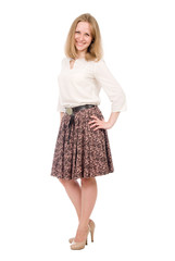 Fashion portrait young woman in skirt posing full length isolated over white