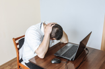 Office worker in white shirt. Occupational burnout. Bad work conditions. Unhappy manager with...