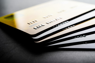 Credit cards that are stacked neatly together,selective focus