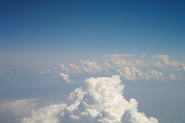 clouds and blue sky seen from plane