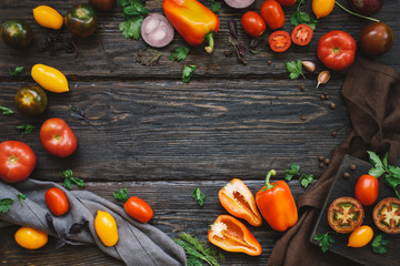Autumn harvest of organic vegetables. Rustic table background, top view, frame.
