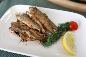Plate with fried red mullet