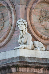 Statue of beautiful sphinx in downtown of Potsdam, Germany, portrait, details