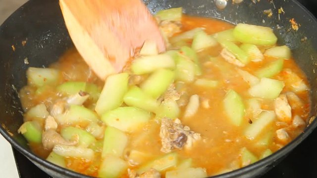 Cooking winter melon curry with chicken, Thai northern food