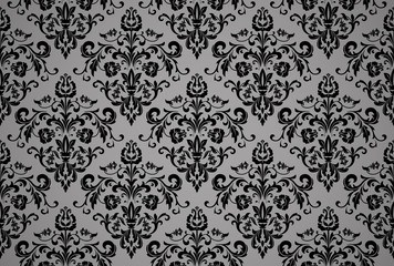 Wallpaper in the style of Baroque. Seamless vector background. Black and grey floral ornament. Graphic pattern for fabric, wallpaper, packaging. Ornate Damask flower ornament