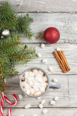 Winter hot drink. Christmas hot chocolate or cocoa with marshmallow on white with christmas decorations