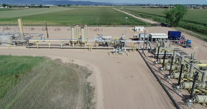 Flying over part of an oil frack pad.