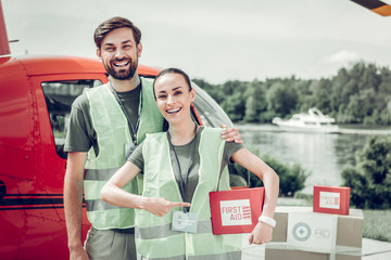 Humanitarian officers sending first aid boxes to military places