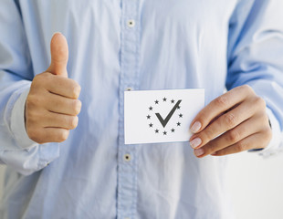 Woman holding an european ballot