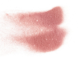 Pink glitter sparkles on white background