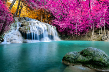 Amazing in nature, beautiful waterfall at colorful autumn forest in fall season