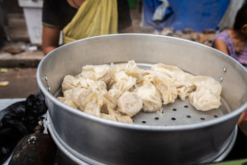 Pork and Chicken Stuffed steamed Momo for sale.