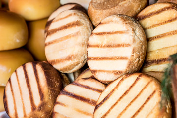 Traditional romanian  smoked sheep cheeses cas and cascaval