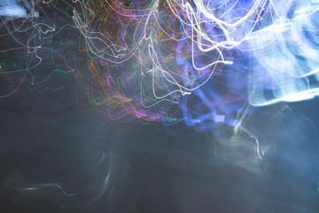 Vivid, tangled streaks of light. Poznan,  city night blurred lights, drugs like perceptions....