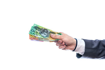 Male hand with australian dollars isolated on white