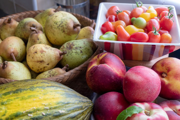 organic fruits from garden, tomatoes, pears, peaches