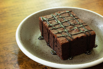 piece of chocolate brownie in dish