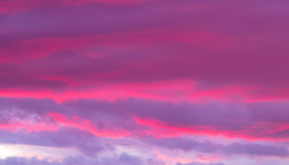 Beautiful clouds at sunset as a background