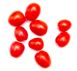Red cherry tomatoes on a white background