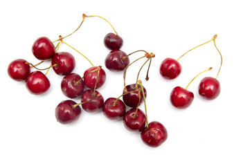 Obraz na płótnie Canvas Ripe cherry berries on a white background