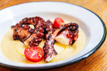Mediterranean Octopus with vegetables and potatoes