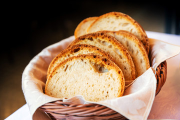 bread in basket - little roll breads in basket on table
