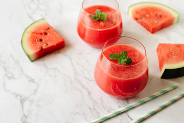 Watermelon drink in glasses with mint. Summer drink concept.