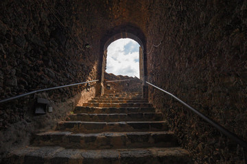 Internal staircase of the medieval castle of Aci Castello in Sicily, Italy.